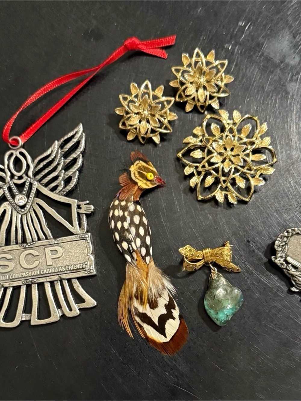 Lot of 4 pins, 1 Ornament and clip-on earrings.